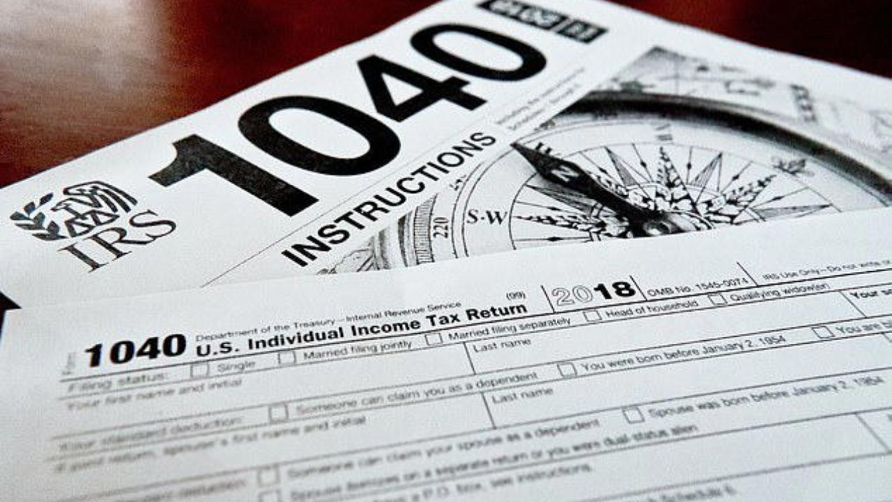 A close-up photograph of a Form 1040 for the 2022 tax year, highlighting the impending April 15 deadline for claiming unclaimed refunds.